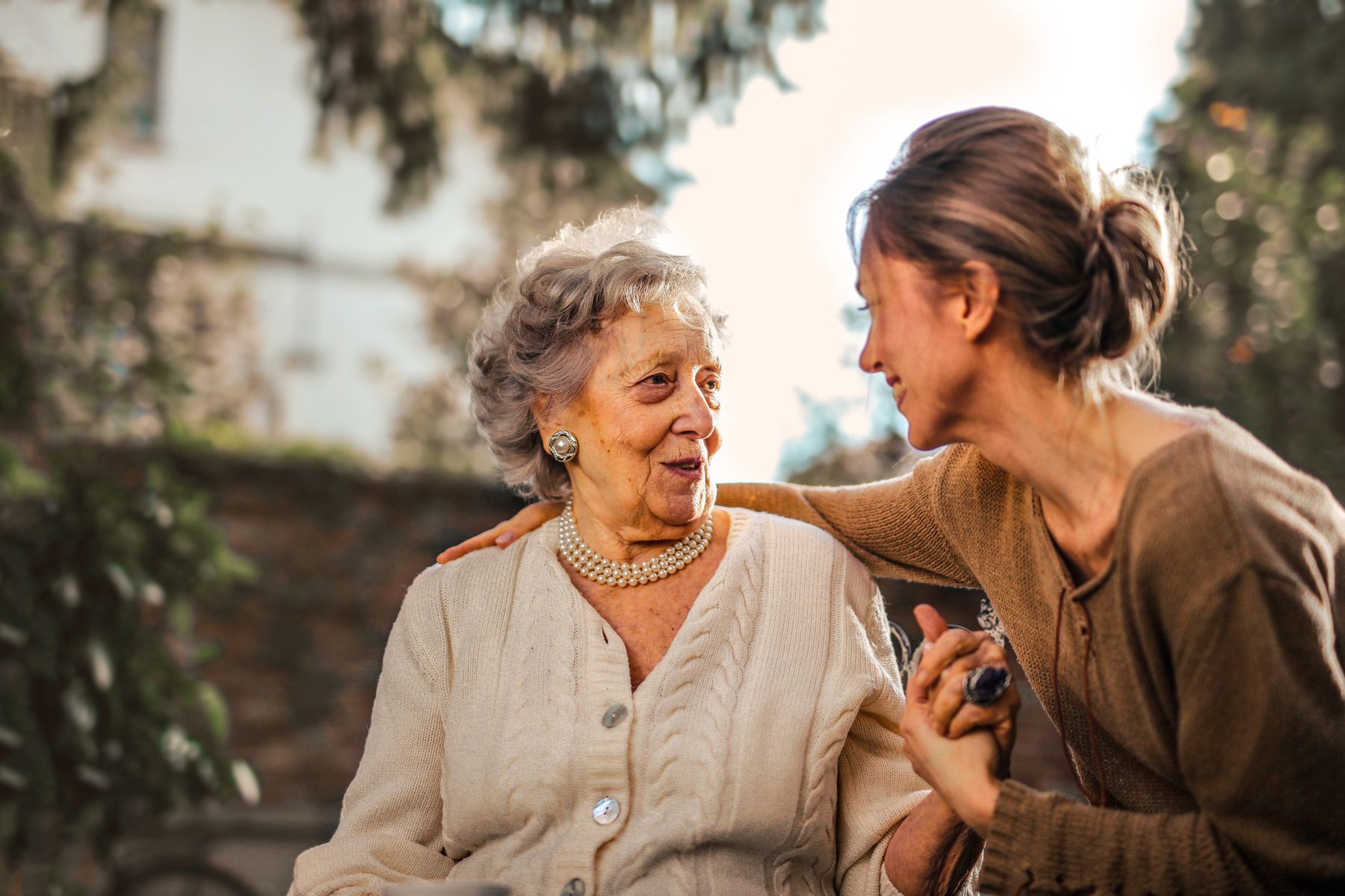 Home health caregiver visiting a senior citizen at home